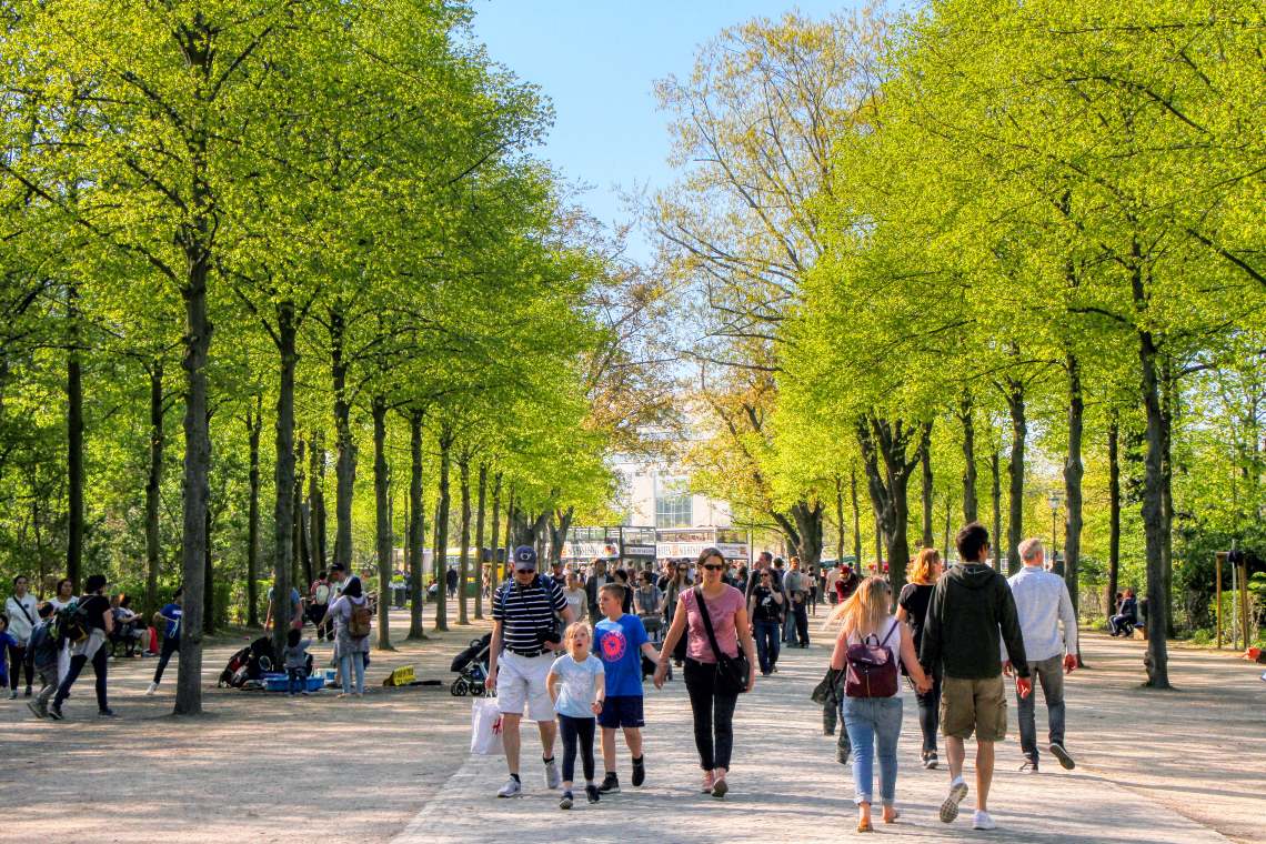 Berliners taking a stroll in Berlin’s Großer Tiergarten during spring